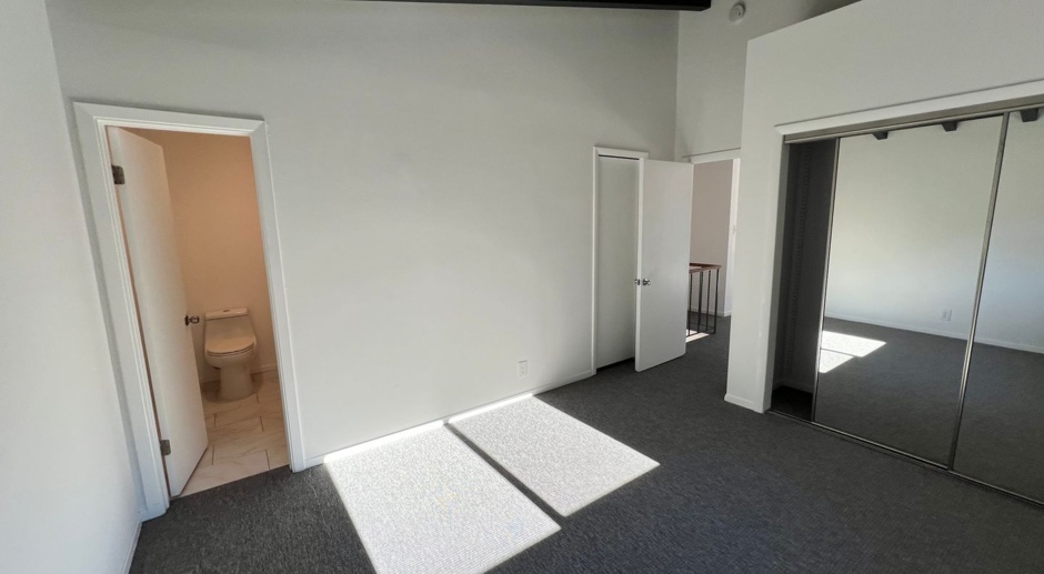 Updated 3-bedroom, 2-bathroom, top-floor unit of a duplex property