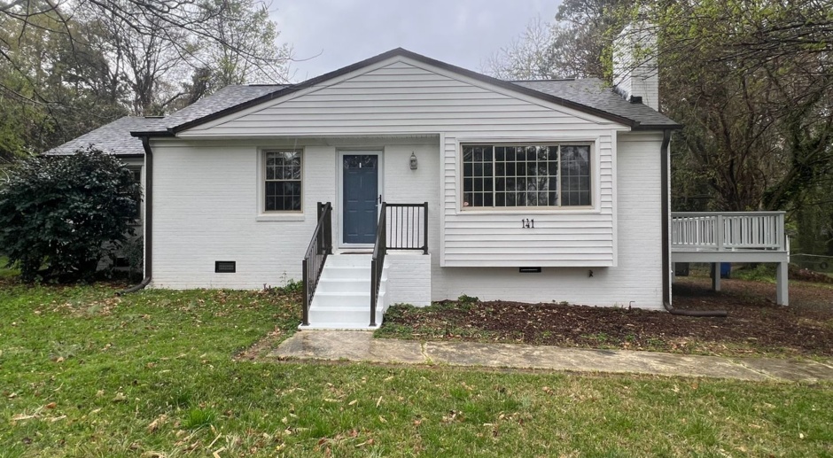 Authentic 3BD, 2BA Raleigh Home with Spacious Yard and Wood Burning Fireplace