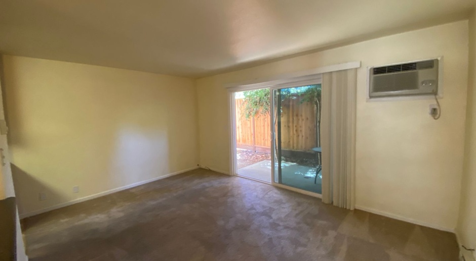 CAMPBELL - Ground level condo in gated community with garage, laundry and private patio - great location.