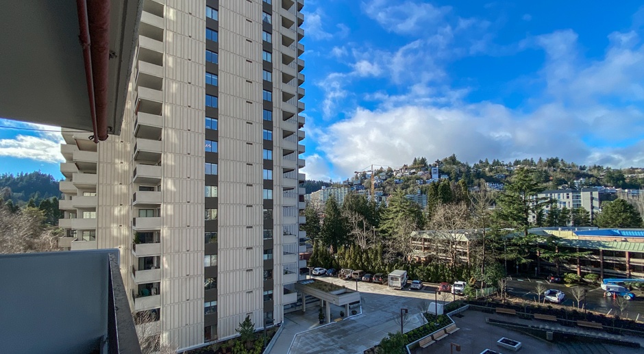 Lovely 2 Bedroom / 1 Bathroom Condo with Beautiful Updates and Views! ~ Minutes from OHSU, PSU! This Beautiful Condo includes One Garage Parking Space + A Storage Room! and so much more!!!