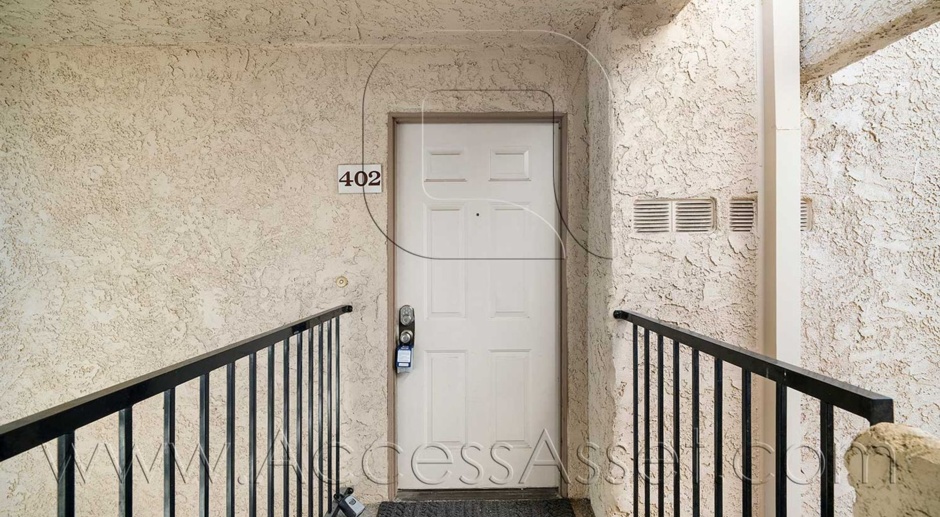 Charming Upstairs 2 Bed/2 Bath  Condo That Combines Comfort, Style, And Convenience!