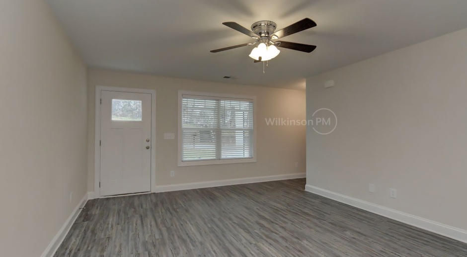 Contemporary 3BR, 2.5BTH Home Featuring a Gleaming Kitchen, LVP Floors, and Serene Deck near downtown Statesville
