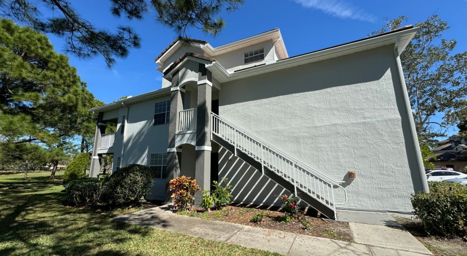 *Garage Included* First floor CORNER UNIT, 2br 2ba in GATED COMMUNITY of Audubon Villas in HUNTER'S CREEK, with ALL TILE FLOORS!! 