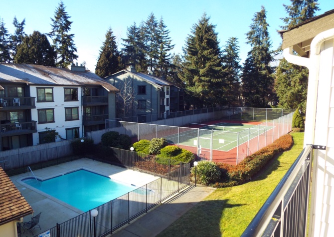 Houses Near PRICE DROP! Conveniently Located 2 BR 2 BT Kirkland Condo w/ Community Pool, Exercise Room and MORE!