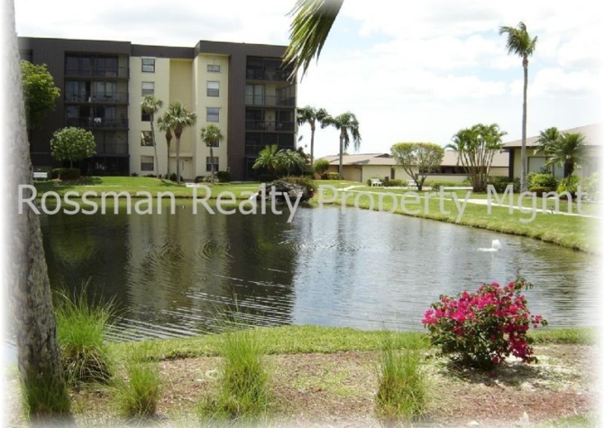 Houses Near 1/1.5  Condo in gated community with a carport 